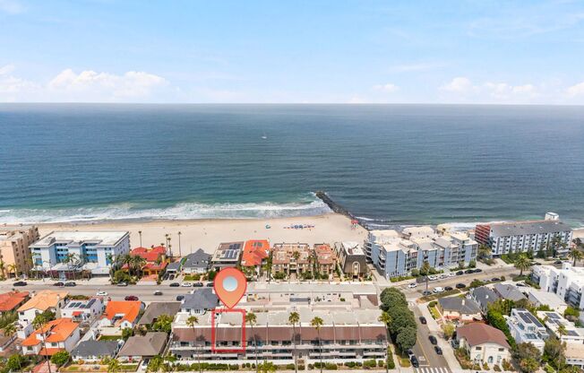 Updated, Bright & Airy Loft-Style Penthouse Condo w/ Ocean Views, Large Rooftop Deck & Balcony & Gated 2-Car Parking in the Exclusive Bay Point Community Just 50 Ft to Beach & Blocks to Hollywood Riviera!