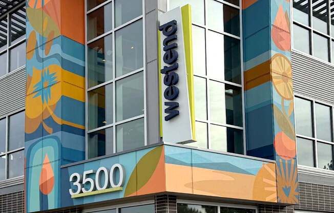 A building with a large sign that says "Weekend" on it.