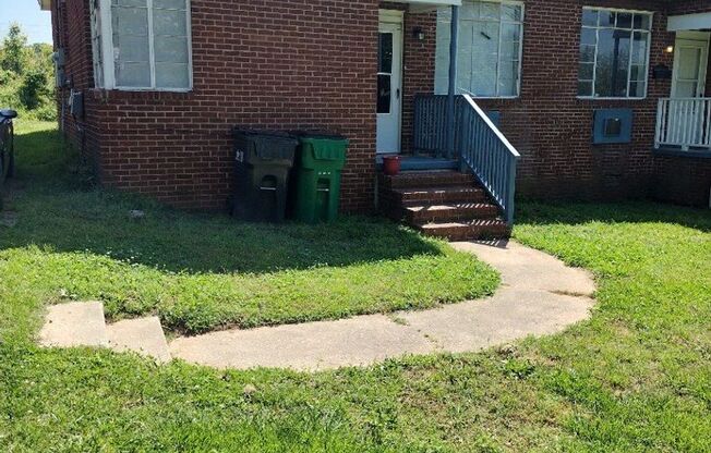 This 2 bed 1 bath duplex home is all brick located near Remount Rd and West Blvd.