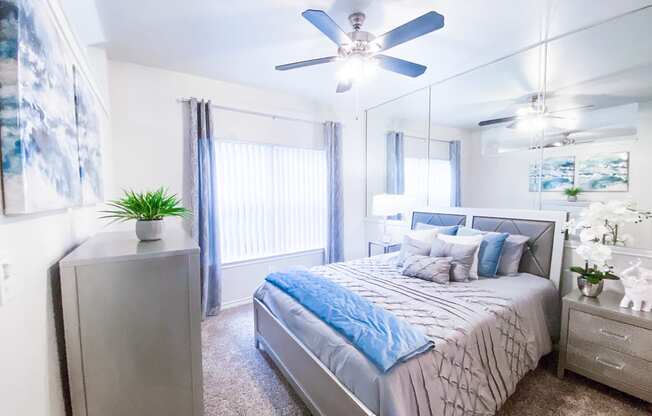 Scenic bedroom windows at Tuscany Square Apartments in North Dallas, TX. Now leasing studios, 1 and 2 bedroom apartments.