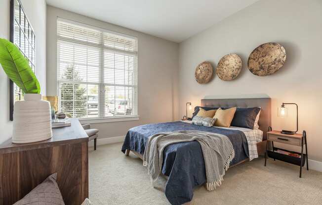 The Airdrie at Paoli Station carpeted bedroom with oversized windows