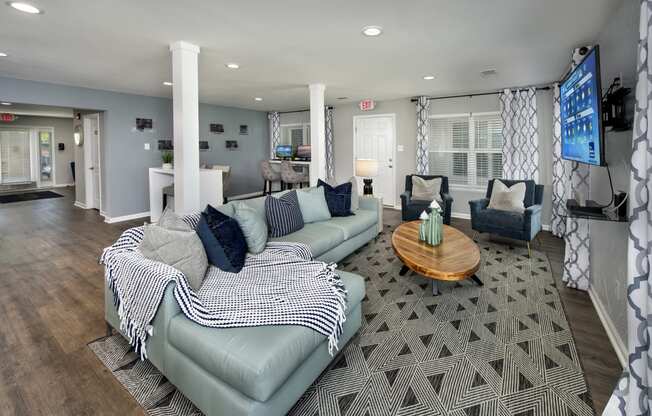 a living room with couches and a coffee table