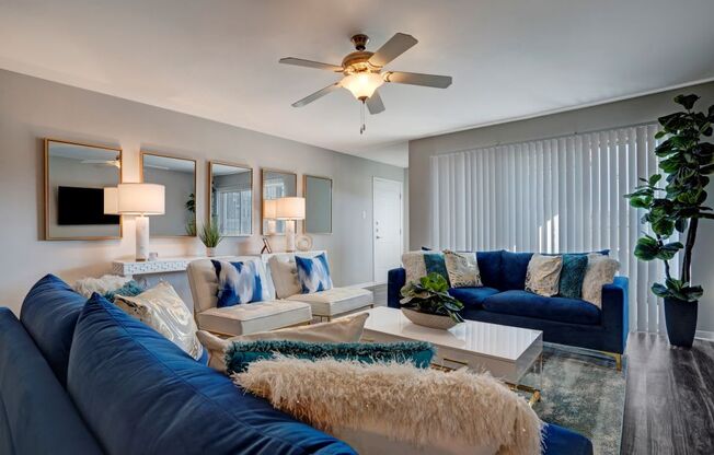 Living Room With Ceiling Fan at Latitude 2976, Texas