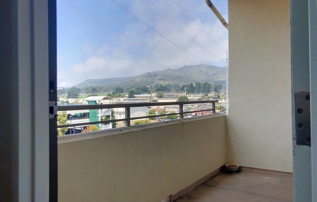 1 Bed, 1 Bath Penthouse Level Condo w Parking - Across from BART