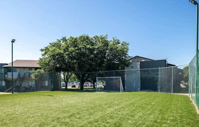 fusion Fort Worth soccer field with tall green fence surrounding