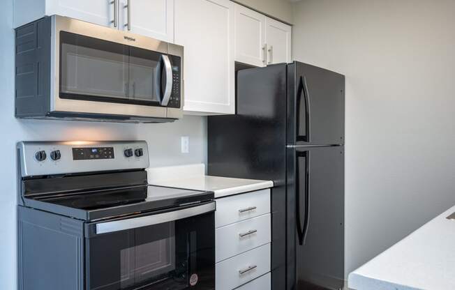 Village at Sunrise | Kitchen with White Cabinets