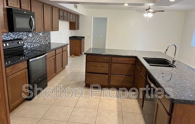 9719 W WRANGLER DR