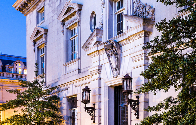 Exterior of Leasing Office with opulent entrance during twilight