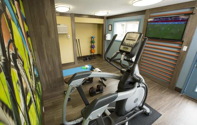 Abby creek fitness center with elliptical and tv
