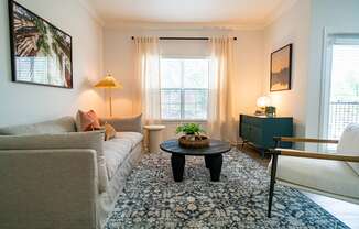 a living room with a couch and a coffee table