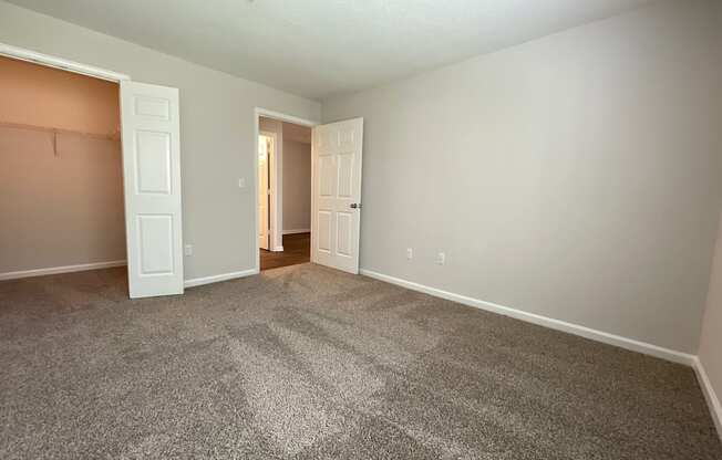 spacious bedroom with walk-in closet at Palmetto Place, South Carolina