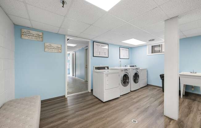 the preserve at ballantyne commons laundry room with washers and dryers