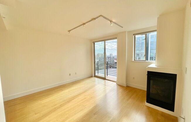Top Floor 2 bed / 2 bath, city views from private balcony, Garage, In Unit Laundry, Centrally Located Condo, Pet ok - PROGRESSIVE