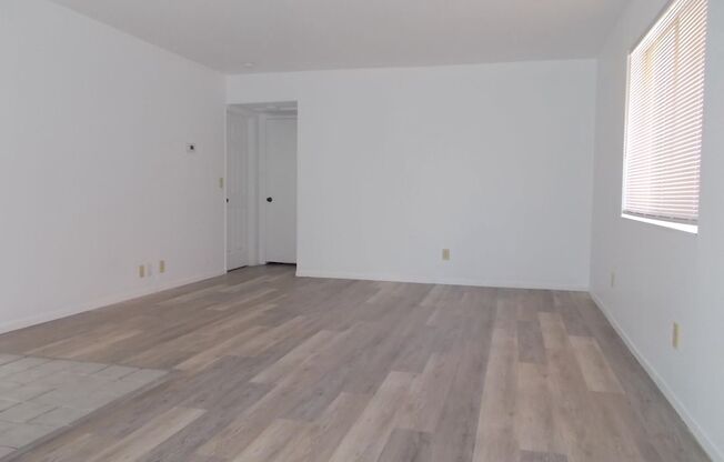 Charming Upstairs Condo with Private Balcony