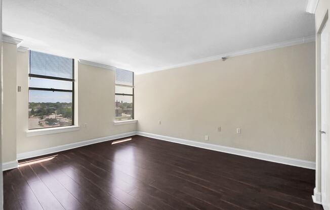 Spacious living room with natural light. Hardwood floors and luxury feel. One Bedroom Apartments in Saginaw, MI