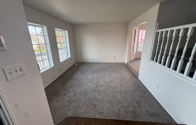 Bright NE Tacoma Home 3 Bedroom 2 Bath, Peaking Sound View with a 3 Car Garage & Fenced Yard!
