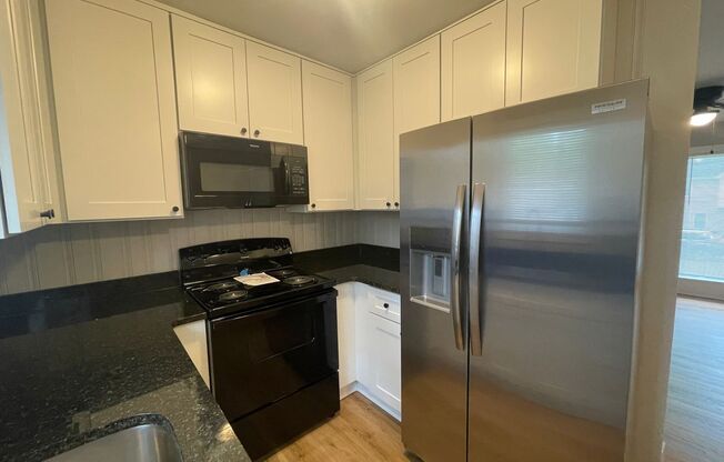 Welcome to Burgess2937, A Newly renovated charming 2-bedroom, 1-bathroom Duplex located in the vibrant city of Charlotte, NC