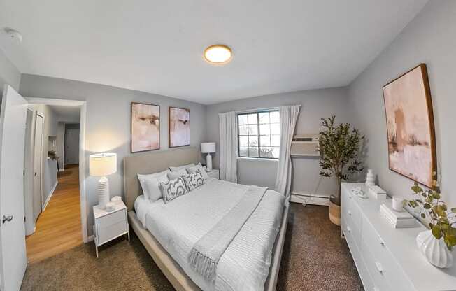 a bedroom with a large bed and a closet
