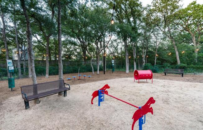 Shaded, fenced, and thoughtfully equipped—our on-site dog park makes playtime a treat for both pups and their people.