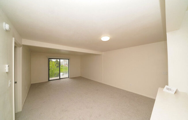 Open Living Room/Dining Area at Arbor Lakes Apartments in Elkhart, IN