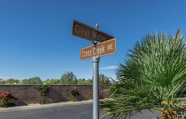 a street sign sitting on the side of a road