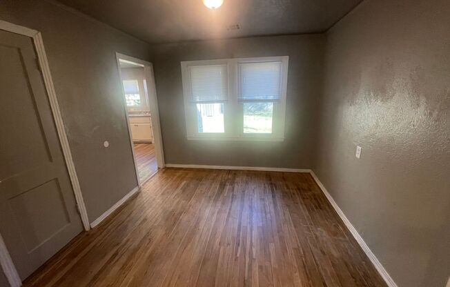 3 bed, 1 bath , beautiful wood floors, fenced backyard, laundry connections, fridge, gas range and storage shed! Cute, clean and ready for move in!