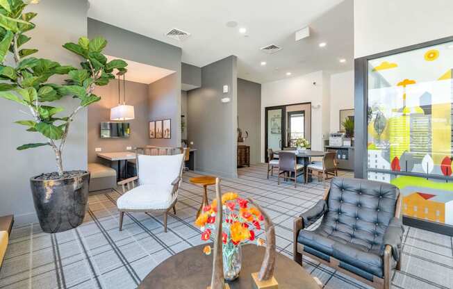 a living room with chairs and a tableat Weylyn Luxury Apartments, Laveen, 85339