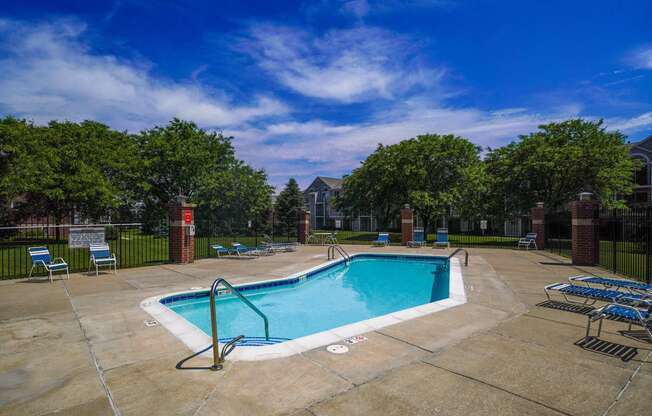 Refreshing pool and large sundeck with free Wi Fi at Foxwood and The Hermitage, Portage, Michigan