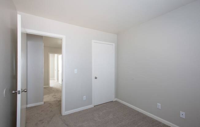 Bedroom and Hallway at The Bluffs at Tierra Contenta Apartments in Santa Fe New Mexico