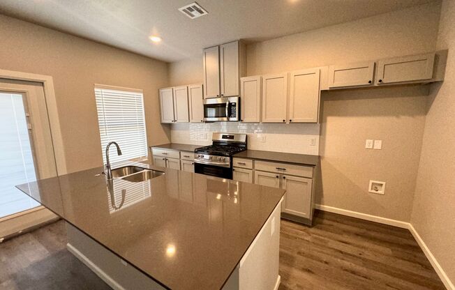 Energy-Efficient Townhomes Near Wilshire/County Line!