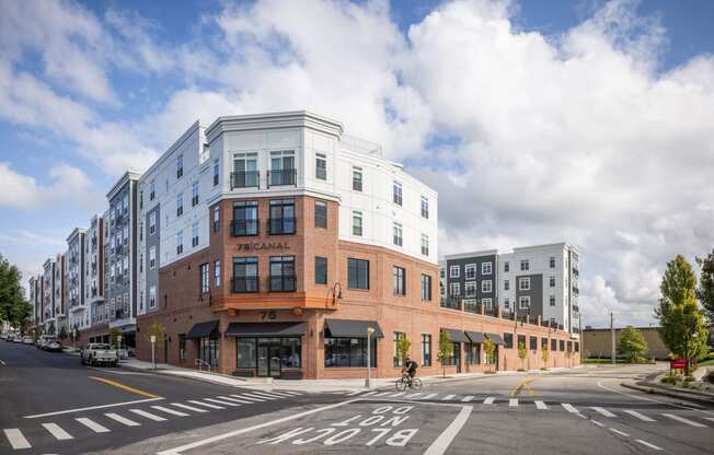 a rendering of a building on the corner of a street