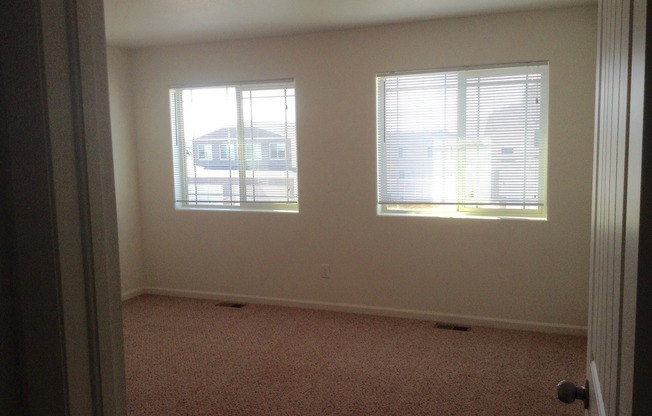 3 BEDROOM, 2.5 BATHROOM, SADDLE RIDGE TWINHOME WITH 2 CAR ATTACHED GARAGE
