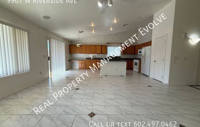 9907 W RIVERSIDE AVE