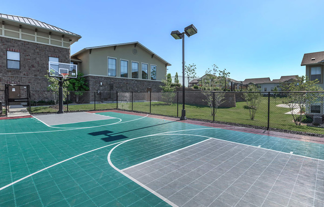 Basketball Court in Prairie Creek Apartments in Kansas  at Prairie Creek Apartments & Townhomes, Lenexa, 66219