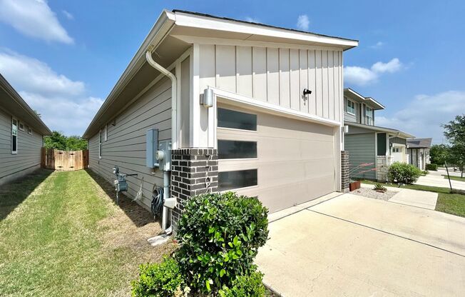 Modern and Cozy 3BR/2BA Home with Garage, Fenced Yard & Covered Deck!