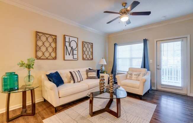 a living room with two couches and a coffee table