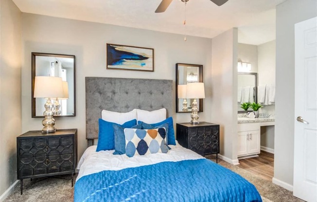 a bedroom with a bed and a ceiling fan at Glen Hollow, Decatur, Georgia