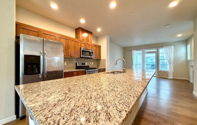 Beautiful Wilsonville Townhouse in Immaculate Tonquin Woods at Villebois Neighborhood! Many Parks, Walking Paths, Sport Courts, Picnic Areas~ Community Garden and Pool! Entertainers Kitchen~ Bonus Loft space~ Double Car Attached Garage
