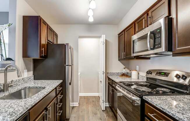 Chef-Inspired Kitchens Feature Stainless Steel Appliances at The Crossings at White Marsh Apartments, Perry Hall, MD, 21128