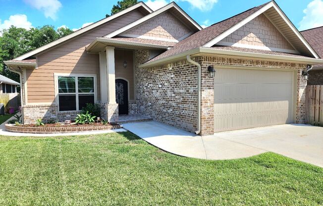 Luxurious 3 Bedroom, 2 Bath Home in the Exclusive Gated Pool Community of Heron Bayou Subdivision!