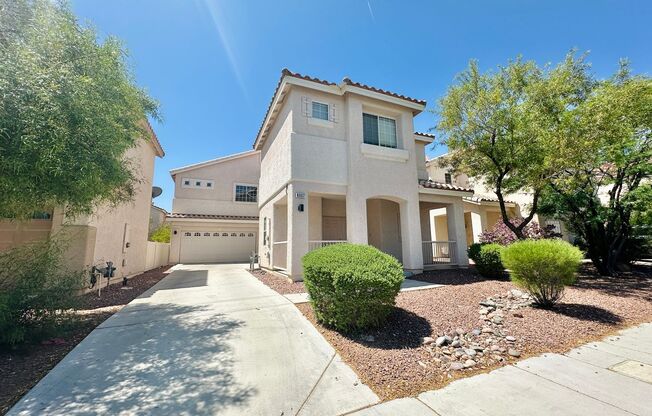 Newly renovated beautiful two story house with brand new vinyl plank flooring, an extra long driveway, and a covered front patio!