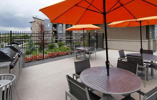 Courtyard Sitting With Umbrella Shades at Lofts at 7800 Apartments, Utah