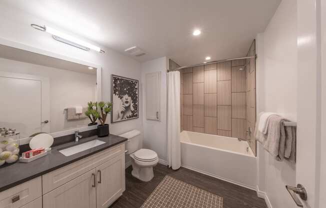 spacious bathroom with white countertops