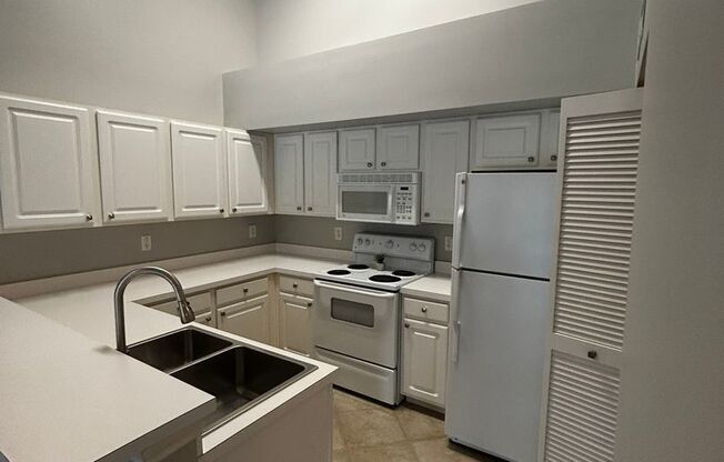 Spacious 1-Bedroom in “The Residence” FIRST MONTHS RENT FREE - Water Included