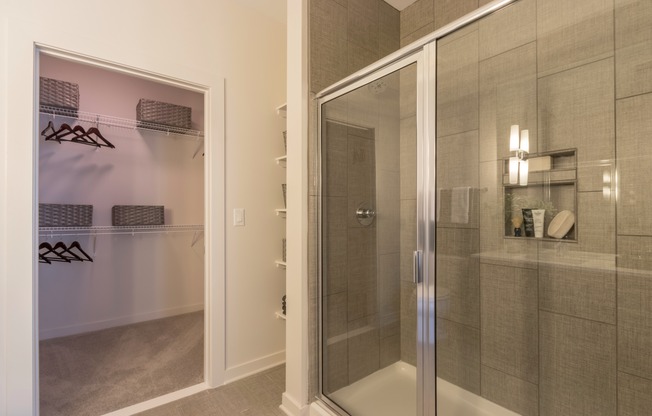 Serene bathrooms with glass enclosed showers*