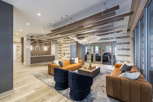 a large lobby with couches and chairs