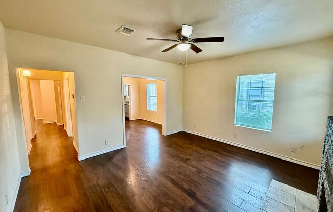 Newly renovated home with all the modern touches: Wood-laminate floors, Stainless Steel Appliances, New Cabinets and Countertops, Large Bedrooms & Backyard