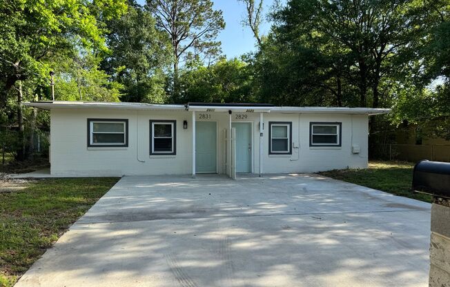 Just Renovated & Move-In Ready! 2BR/1BA Duplex on W 6th St – Pets Welcome!