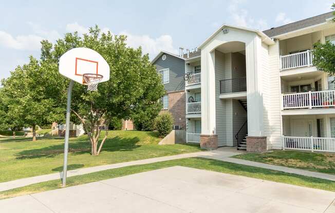 our apartments have a basketball hoop in front of our building