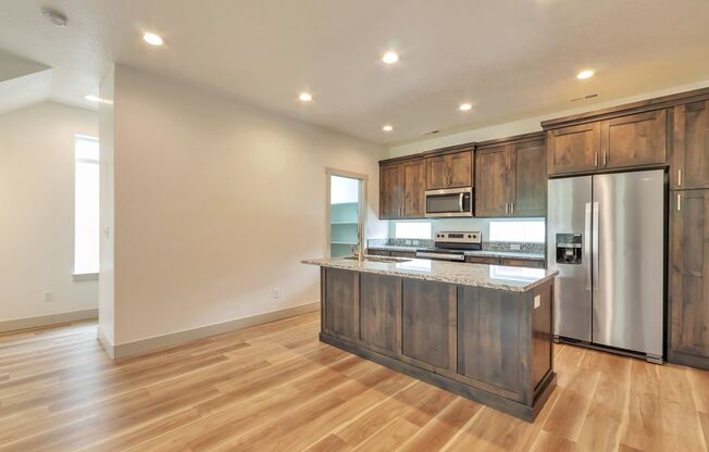 Modern End Unit townhouse w attached 2 car garage!!